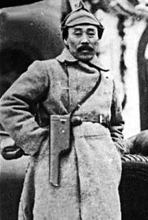 레닌이 선물한 권총 찬 홍범도 - 1922년 1월 모스크바에서 열린 코민테른 주최 극동민족대회에 참석한 독립운동가 홍범도. 차고 있는 권총은 레닌이 선물한 것으로 알려졌다. /독립기념관