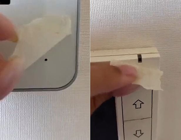 현관 인터폰과 실내 온도조절기 등 구멍처럼 보이는 곳에 종이테이프를 붙인 모습. /트위터